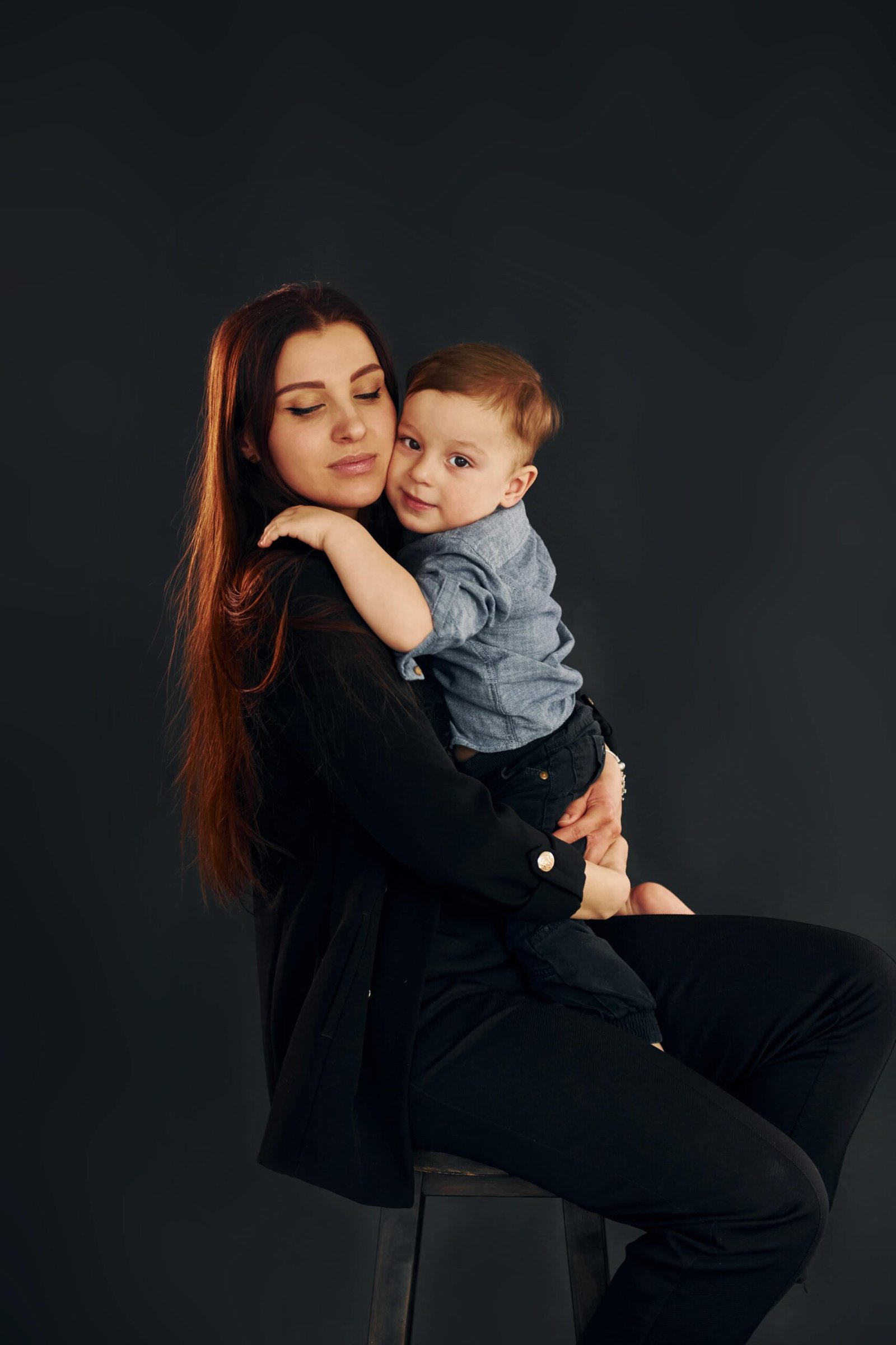 mother-in-stylish-black-clothes-is-with-her-little-2023-11-27-05-28-40-utc-min